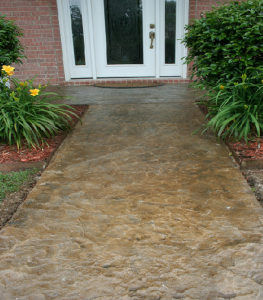 A stamped and stained concrete overlay could be a cost-saving option to replacing your walkway.